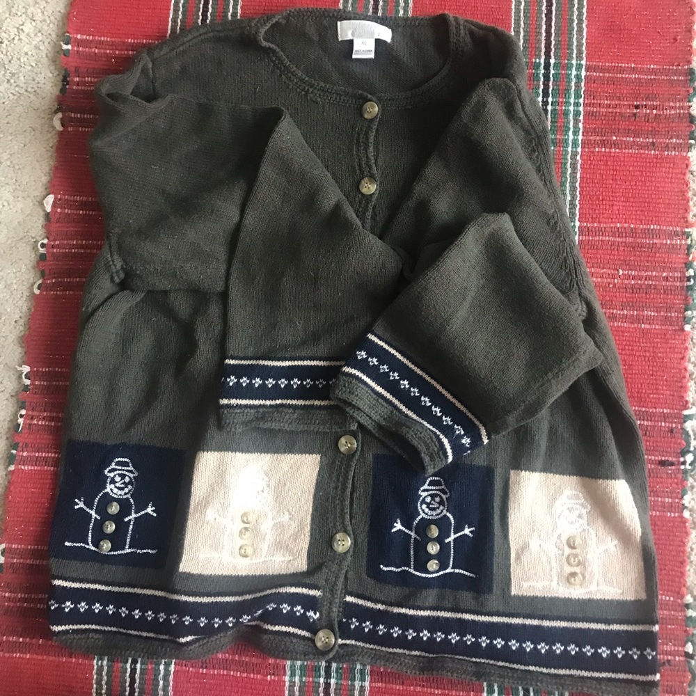 Very cute snowman sweater and size is xl but fits like a medium